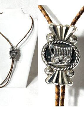Multi-color leather cord, silver-tone stagecoach western cowboy bolo tie.